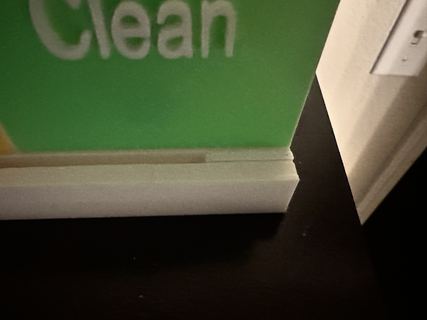 Close-up of the green Clean panel and the white rail beneath it.